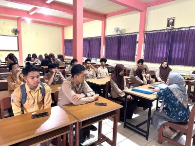 Hj. Rahmi Fahrida, S.Pd